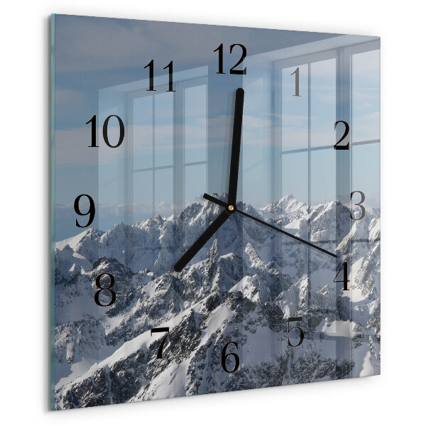 Reloj de vidrio montañas
