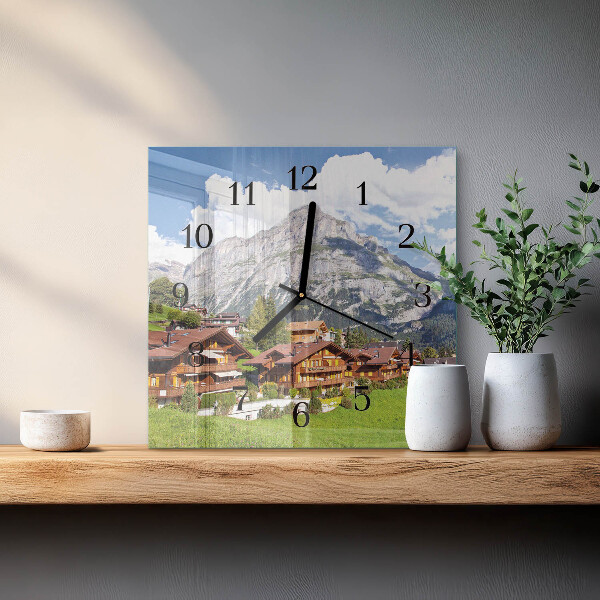 Reloj de vidrio montañas