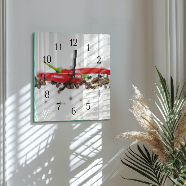 Reloj de vidrio granos de pimienta