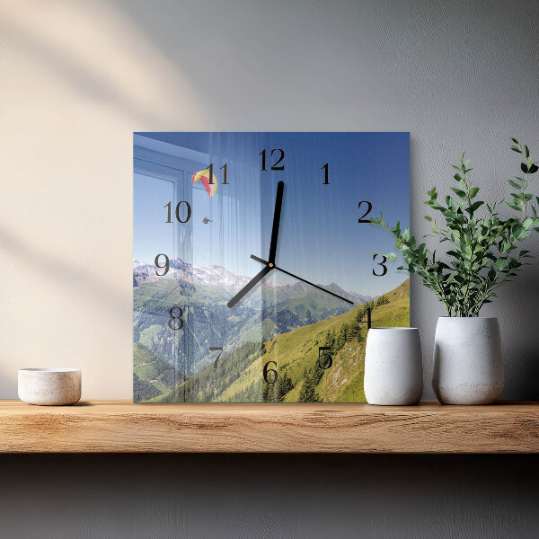 Reloj de vidrio montañas