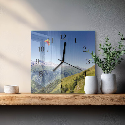 Reloj de vidrio montañas