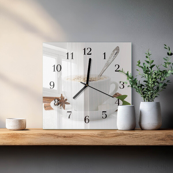 Reloj de vidrio Una taza de anís