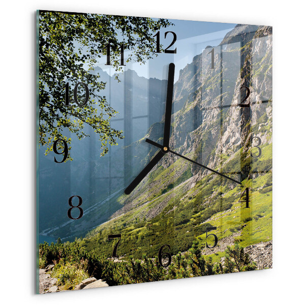 Reloj de vidrio montañas