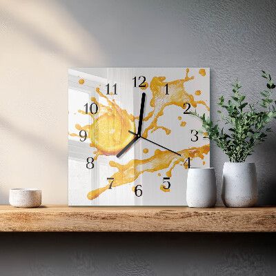 Reloj de vidrio zumo de naranja