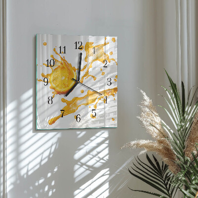 Reloj de vidrio zumo de naranja