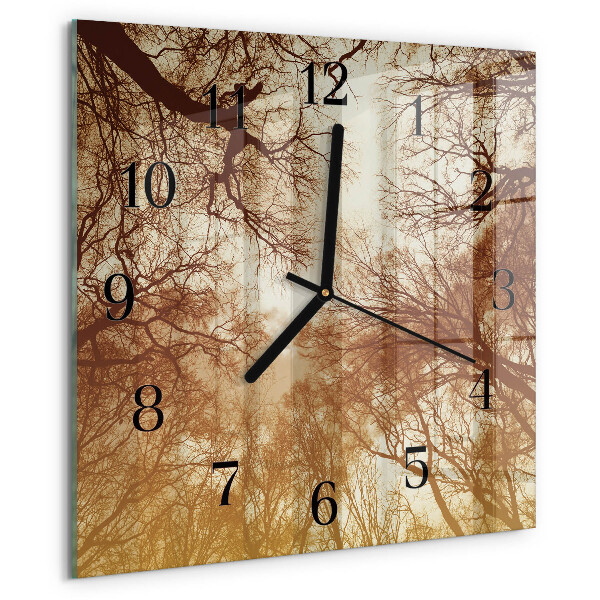 Reloj de vidrio copas de árboles