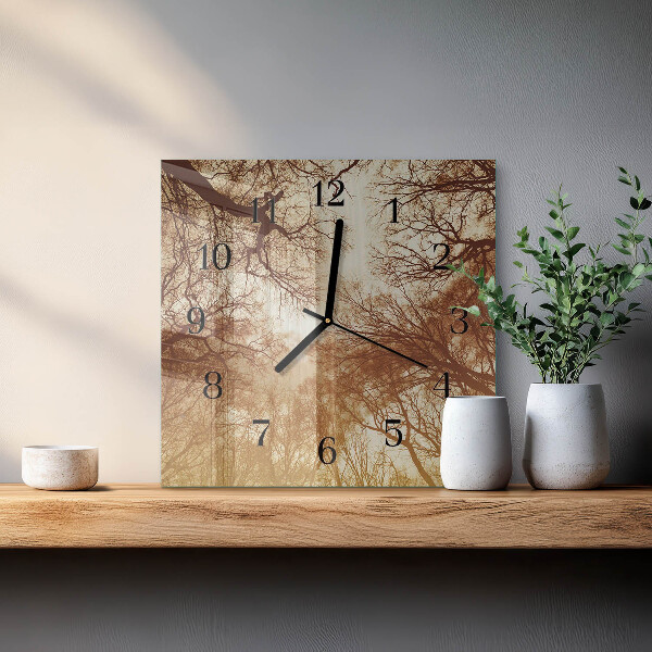 Reloj de vidrio copas de árboles