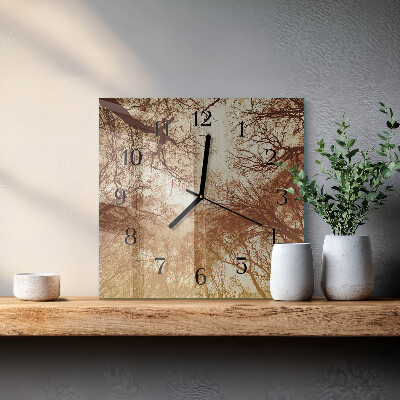 Reloj de vidrio copas de árboles