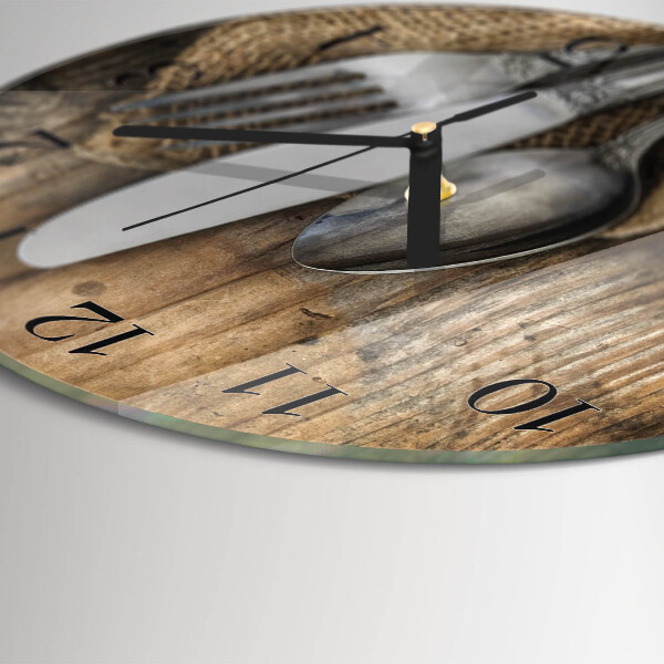 Reloj de pared redondo Cuchillería