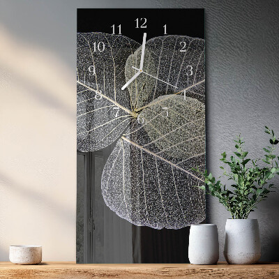 Reloj vertical hojas de plantas