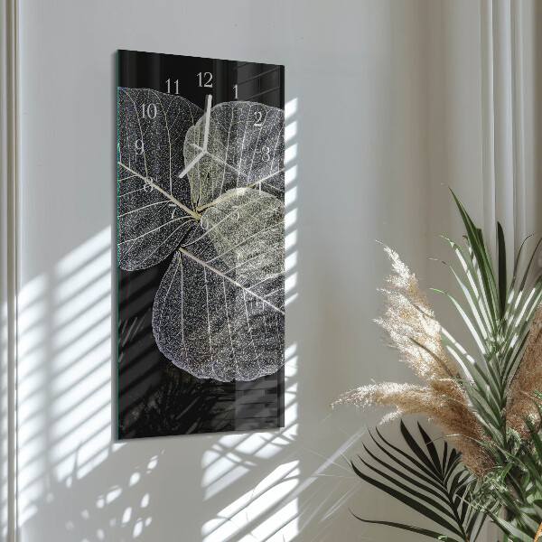 Reloj vertical hojas de plantas