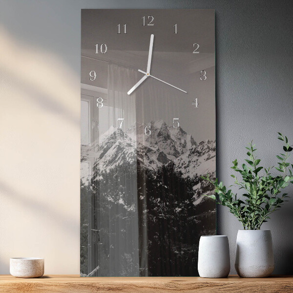 Reloj vertical montañas