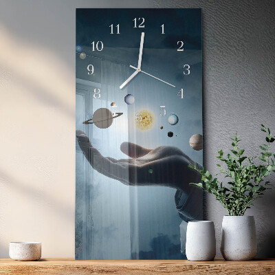 Reloj vertical Mano del Planeta